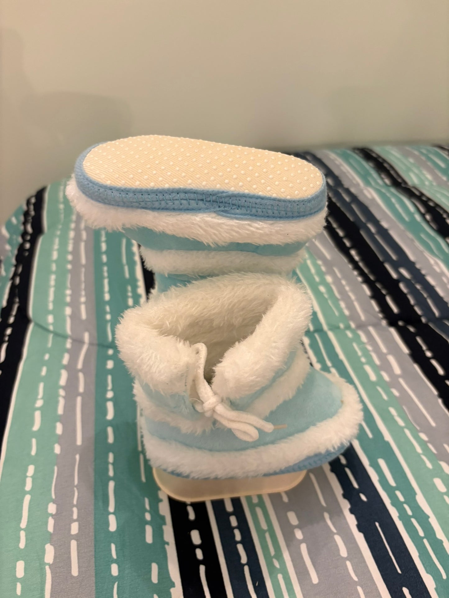 Jolie pantoufle bleu pâle