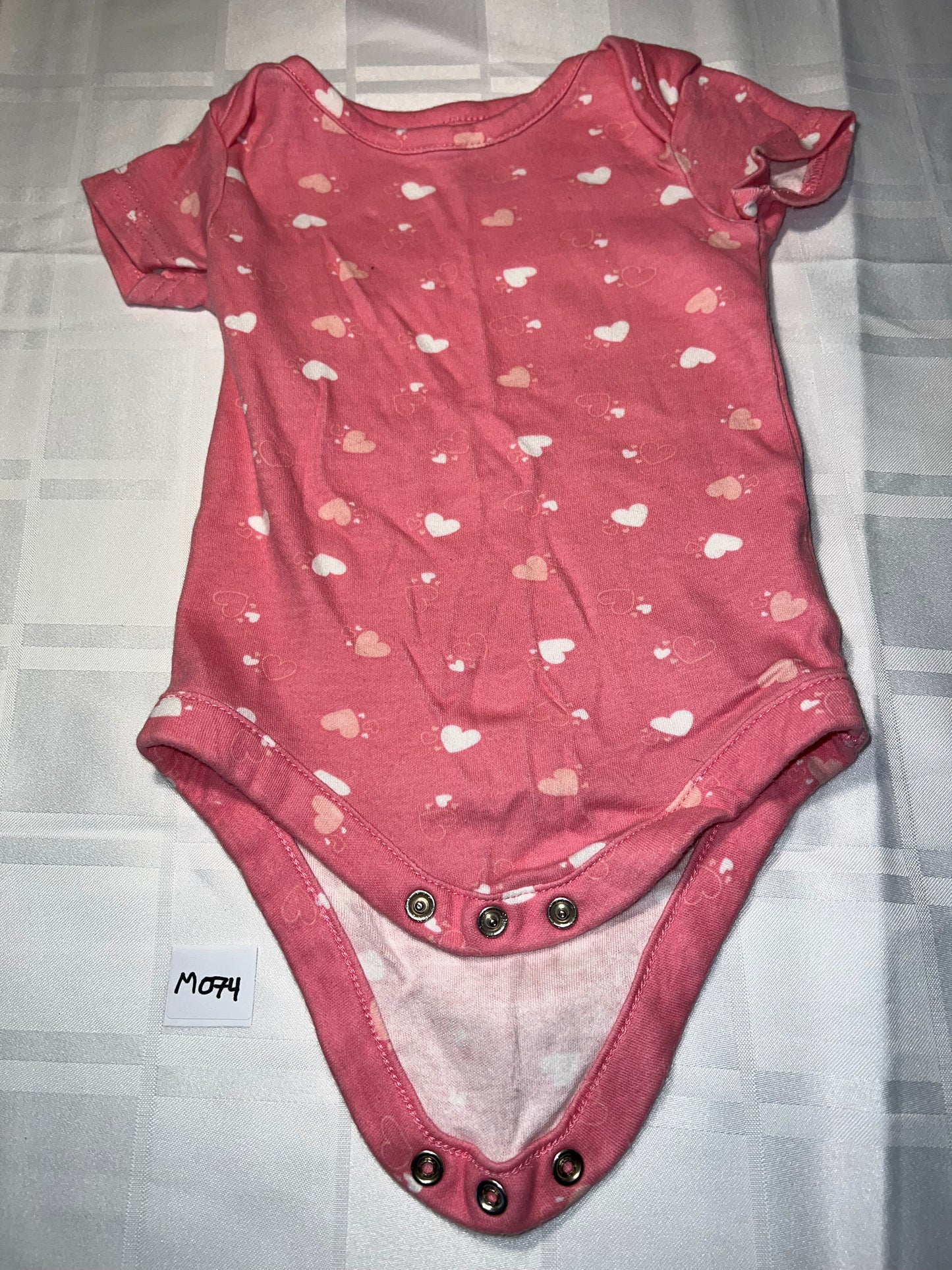 Cache-couche coeur rose